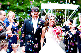 wedding with bubble machine exit from chapel